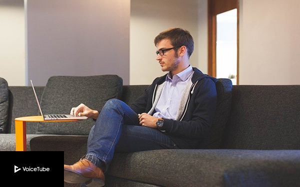 freelance man working on his computer